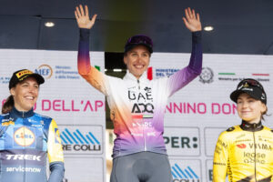 Silvia Persico celebrates victory at the Giro dell'Appennino Donne for UAE Team ADQ in Genoa.