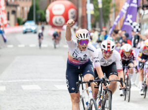 Federica Venturelli celebrates victory at Dwars door de Westhoek in Belgium.